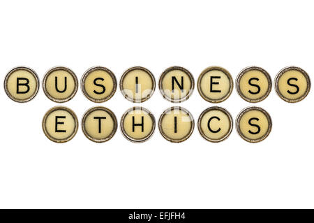 Business Ethics testo nel vecchio round tasti di una macchina da scrivere isolato su bianco Foto Stock