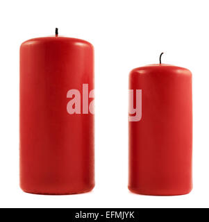 Due piccoli e grandi candele rosse Foto Stock
