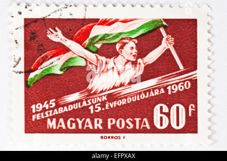 Ungherese francobolli emessi intorno al 1960 per il XV anniversario della sua liberazione dal nazismo. Foto Stock