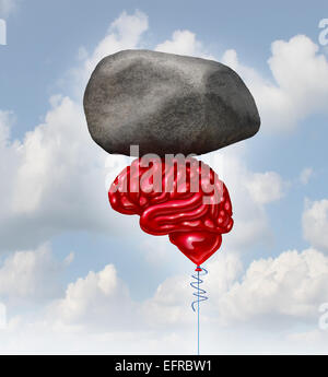 Brain power nozione come un palloncino rosso a forma di un pensiero umano organ solleva un heavy rock come un simbolo e la salute mentale metafora potente creatve intelligenza e memoria. Foto Stock