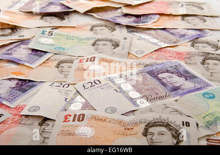 Money uk immagine di sfondo di banconote britanniche assortite Foto Stock