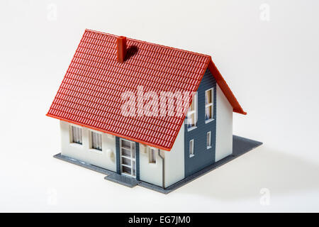 Immagine simbolica, home, casa, settore immobiliare, plastica modello di casa, Foto Stock