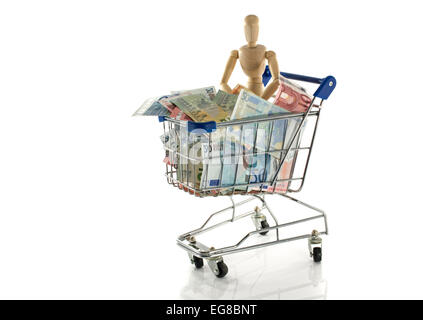 In metallo blu auto shopping riempito con fantoccio giocare con denaro euro paper Foto Stock