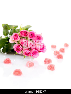 Le rose con la caramella cuori Foto Stock