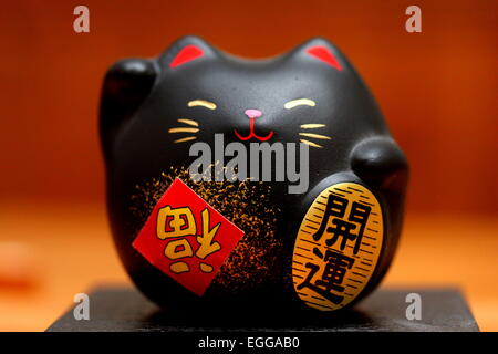 Un Cinese lucky cat Foto Stock