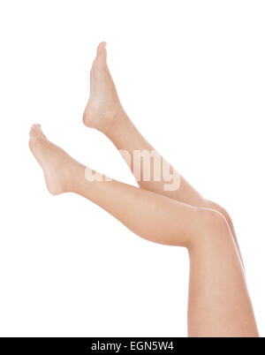 Rasati gambe femmina. Tutto su sfondo bianco Foto Stock