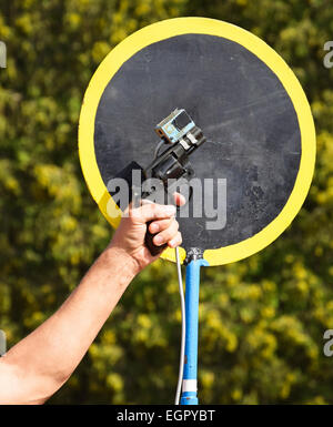 Pistola di partenza alla gara di corsa Foto Stock