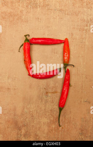 Numero 9 da peperoni rossi. Foto Stock