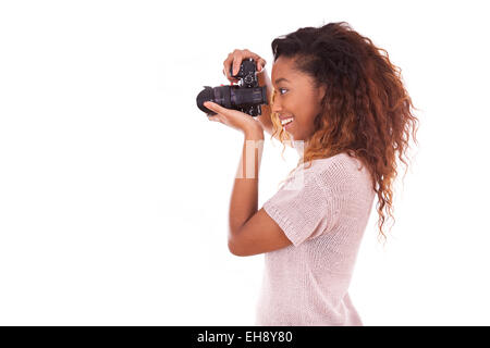 African American fotografo di scattare foto con una fotocamera reflex digitale Foto Stock