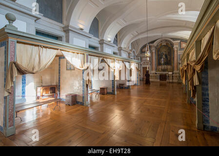 Celle dei monaci nel monastero di Mafra posto nazionale (Palacio de Mafra), Mafra, Portogallo. Foto Stock