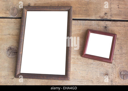 Vecchio photo frame sullo sfondo di legno Foto Stock