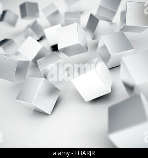 Cade e colpisce di colore grigio metallico cubi Foto Stock