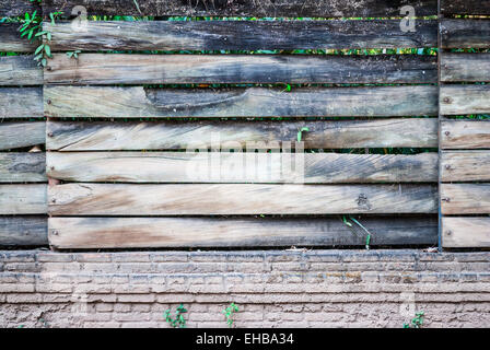 Legno sporco e Sfondo mattone/ Texture. Foto Stock