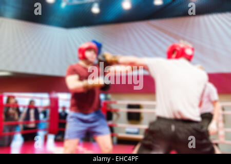 Incontro di pugilato astratta sport di sfocatura dello sfondo con bokeh di fondo Foto Stock