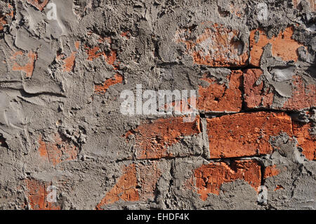 Frammento di ruvido rosso mattone superficie di parete Foto Stock