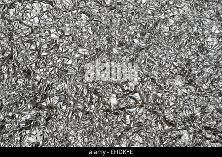 Chiudi vista superficiale accartocciata lamina di alluminio texture Foto Stock