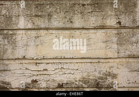 Peeling vernice su grunge parete in legno Foto Stock