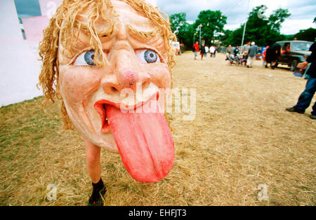 Uomo in costume presso il festival di Glastonbury. Foto Stock