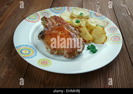 In casa di maiale di lombate di cotto al forno con patate countrylike Foto Stock
