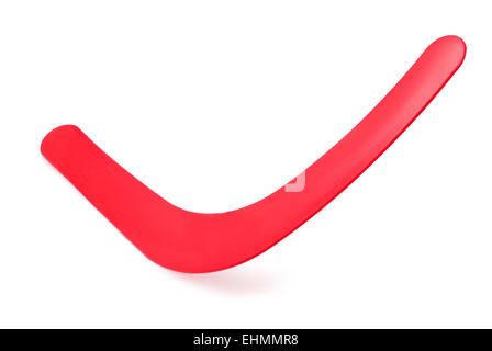 Boomerang rosso su sfondo bianco Foto Stock