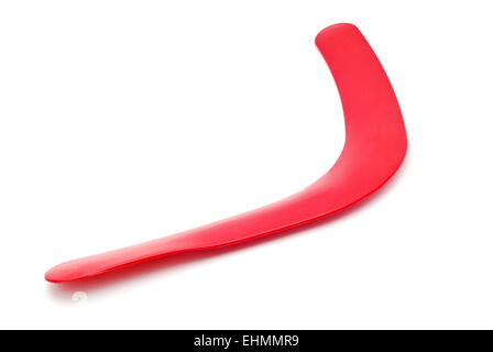 Boomerang rosso su sfondo bianco Foto Stock