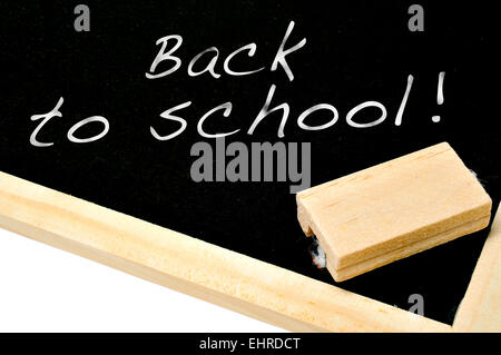 Frase torna a scuola scritto in una lavagna con un telaio in legno Foto Stock