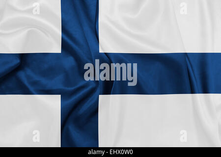 Finlandia - sventola bandiera nazionale sulla tessitura della seta Foto Stock