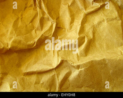 Una immagine di sfondo di alcune crumpled carta da imballo Foto Stock