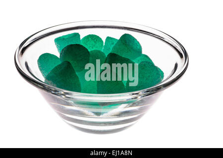 Jelly conia nel bicchiere di vetro sul tavolo luminoso (illuminato dal basso) con tracciato di ritaglio Foto Stock