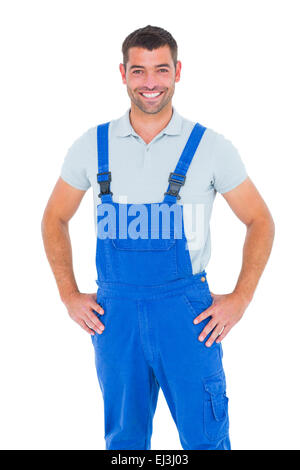 Ritratto di felice repairman in tute da lavoro Foto Stock