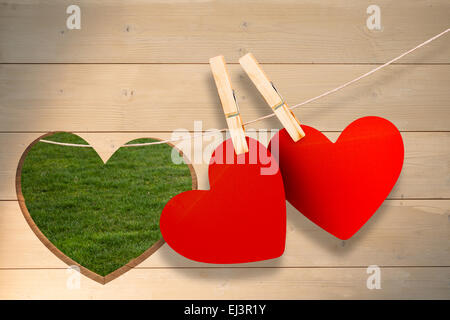 Immagine composita di cuori hanging on line Foto Stock