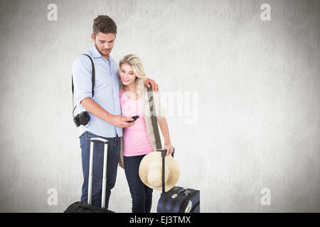 Immagine composita di attraente coppia giovane pronto per andare in vacanza Foto Stock