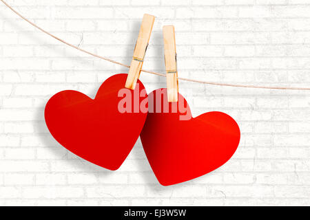 Immagine composita di cuori hanging on line Foto Stock