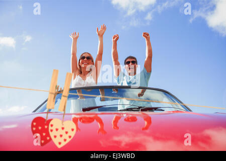 Immagine composita di cuori appesi sulla linea Foto Stock