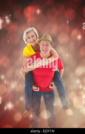 Immagine composita della coppia matura scherzando sulle insieme Foto Stock