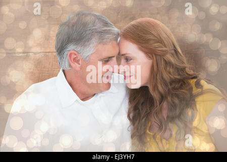 Immagine composita di casual Coppia sorridente ad ogni altro Foto Stock