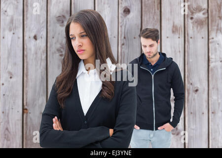 Immagine composita della infelice giovane non parla a ciascun altro Foto Stock