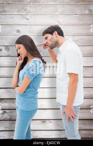 Immagine composita di uomo arrabbiato grida di ragazza Foto Stock