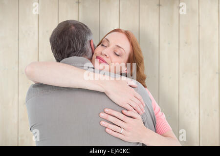 Immagine composita di casual giovane costeggiata ogni altro Foto Stock