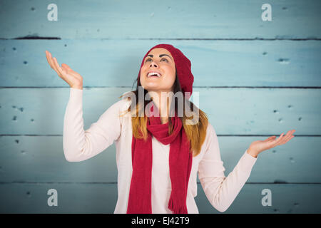 Immagine composita di sorpreso brunette con mani Foto Stock