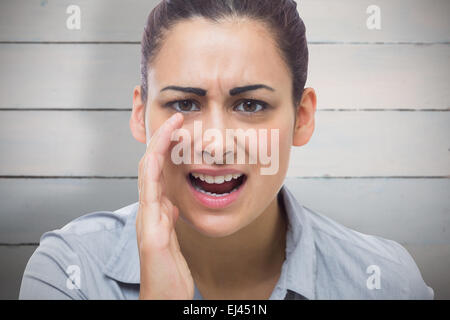 Immagine composita di imprenditrice urlando Foto Stock