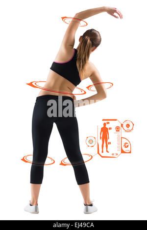 Immagine composita di montare brunette stretching vista posteriore Foto Stock