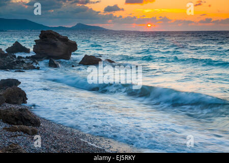 Tramonto sulla costa a Rodi Grecia Europa Foto Stock