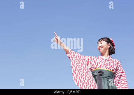 Giovane ragazza giapponese in un kimono Foto Stock