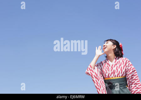 Giovane ragazza giapponese in un kimono Foto Stock