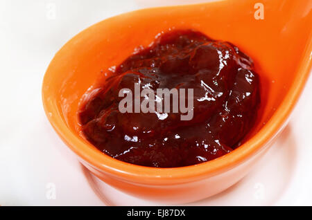 Confettura di fragole in Orange Bowl Foto Stock