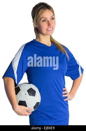 Piuttosto appassionato di calcio in maglia blu Foto Stock