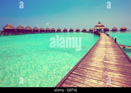 Case su palafitte sul mare. Maldive. Foto Stock