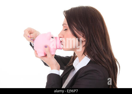 Donna felice kissing piggy Foto Stock