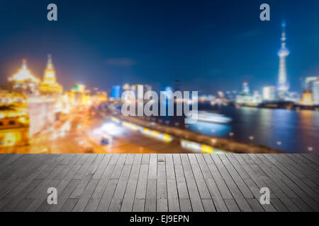 Sfondo bokeh città di Shanghai di notte Foto Stock